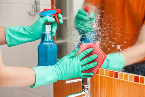 Carpet cleaning technician preparing equipment before a service appointment
